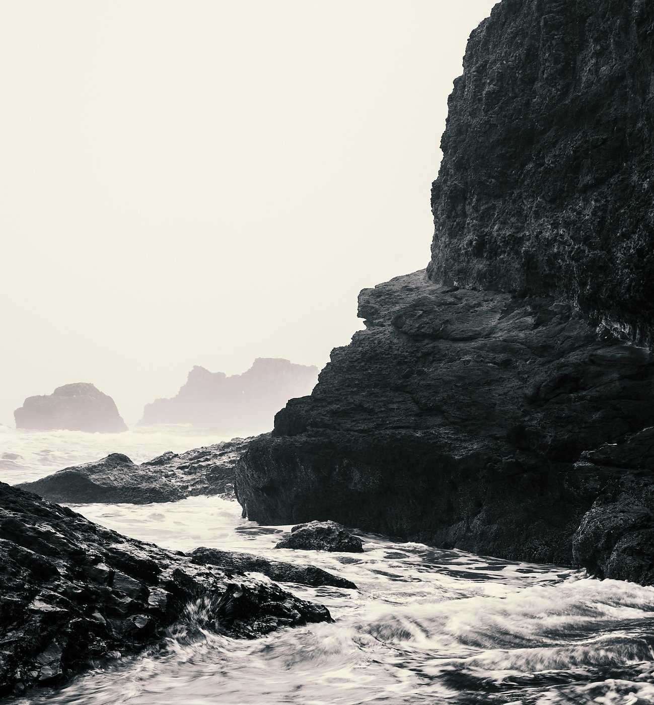 Moody monochrome Oregon Coast sea stacks photography print by Dan Sproul