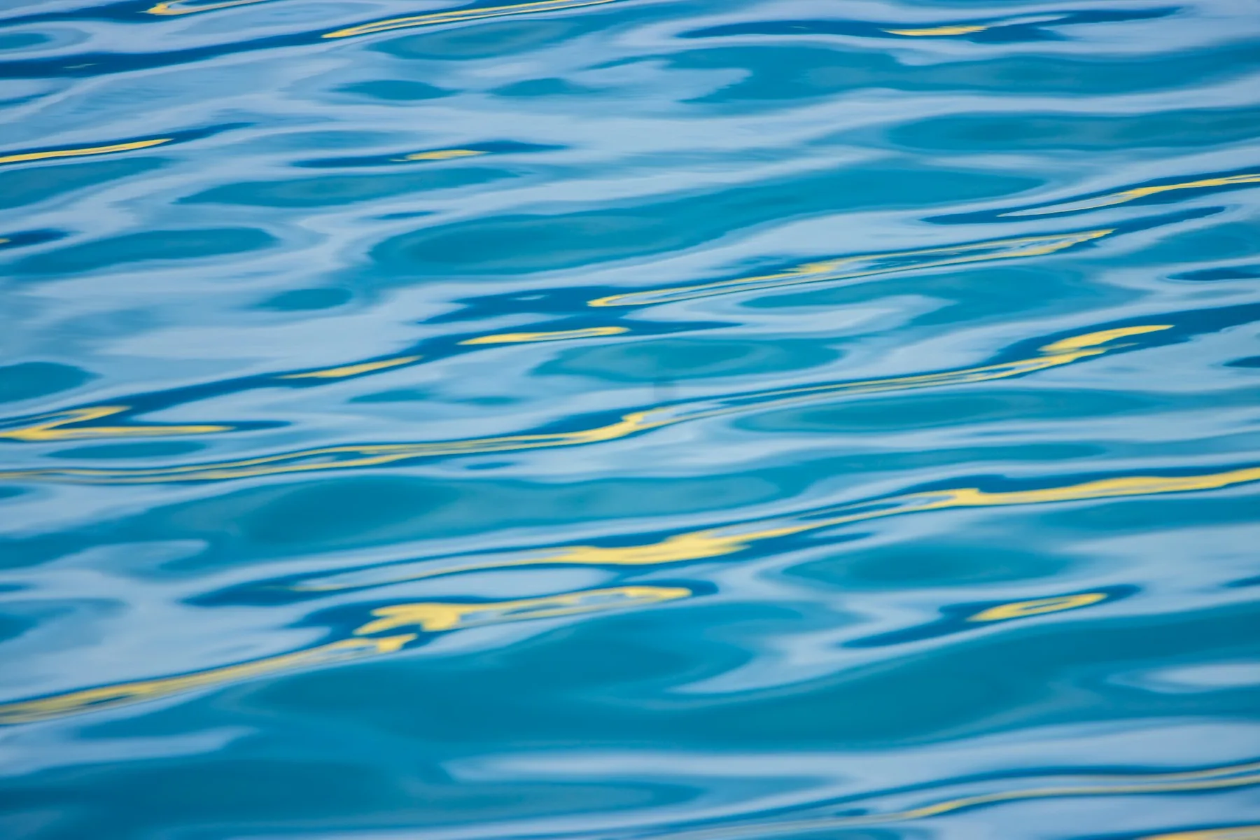 Abstract blue water with reflected color by Dan Sproul