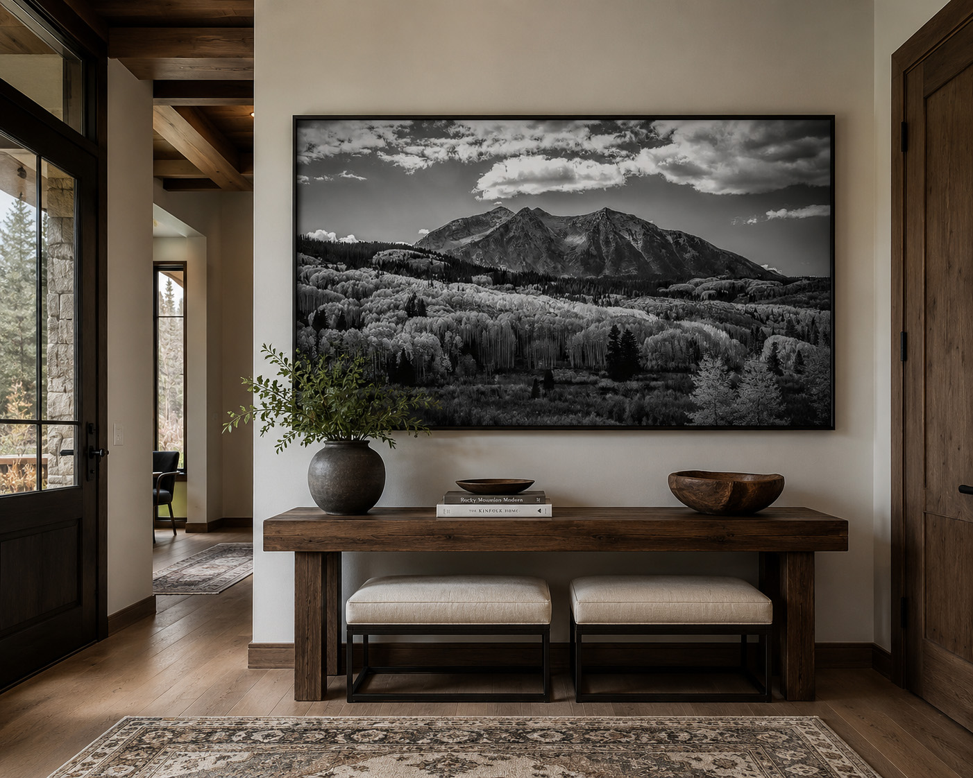 Black and white Colorado mountain photography in modern entryway