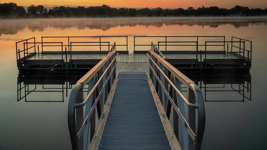 Misty sunrise over the lake dock at Ottawa Metro Park in Lima Ohio by Dan Sproul