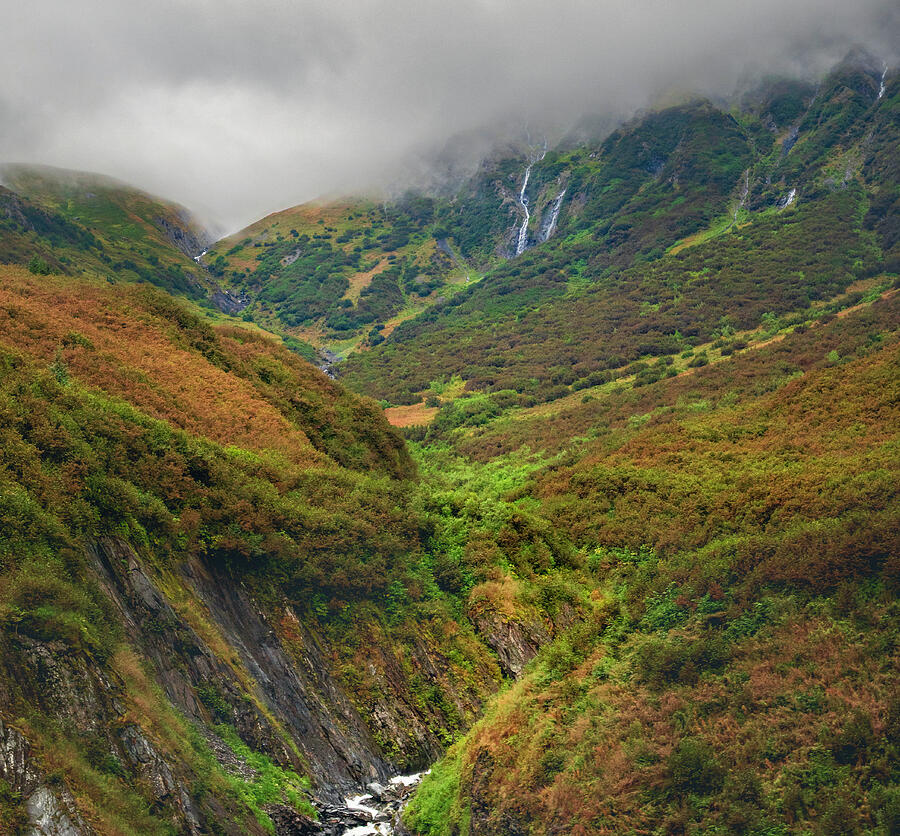 Moody Alaskan mountain valley waterfalls and low clouds landscape print by Dan Sproul