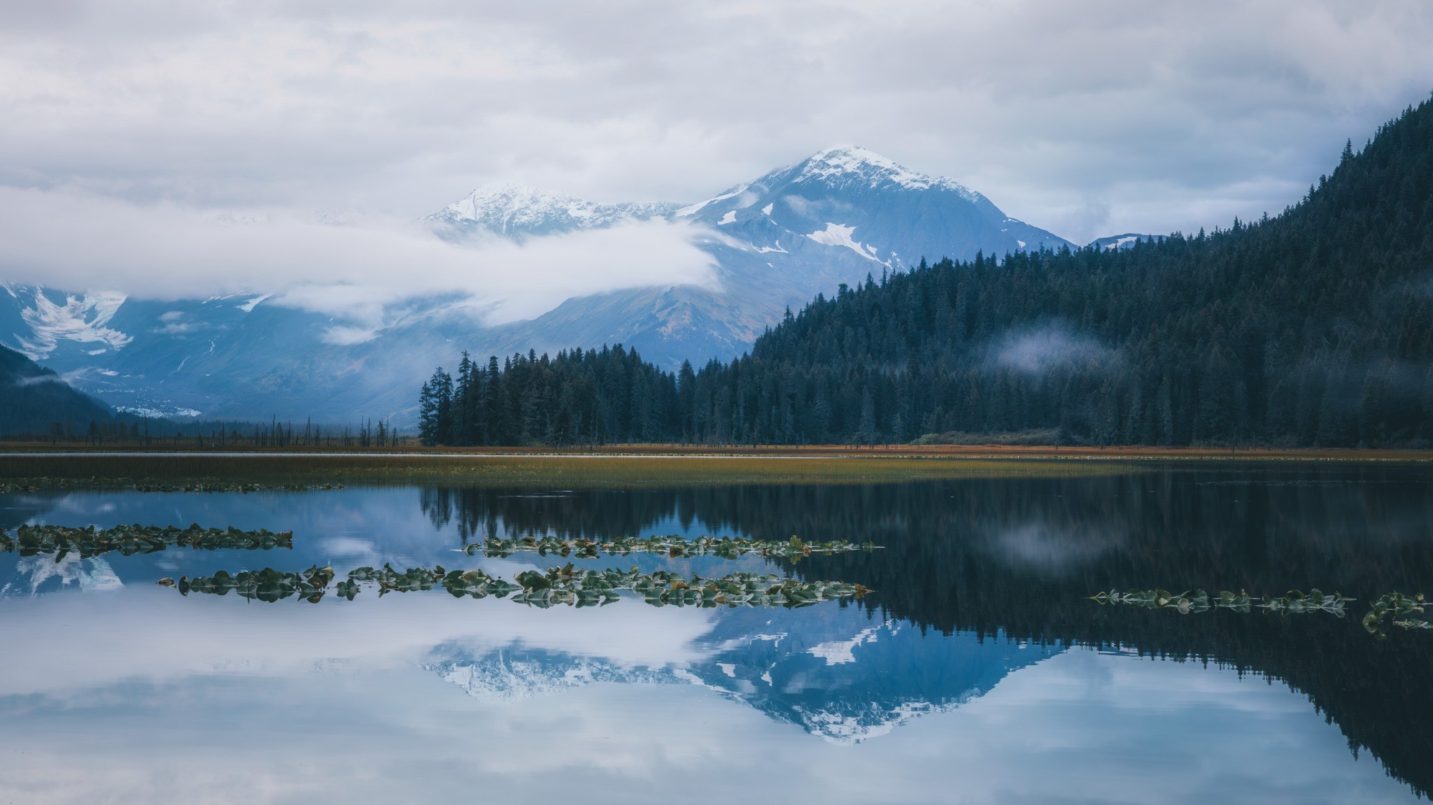Atmospheric mountain lake reflection fine art landscape print for wellness interiors by Dan Sproul