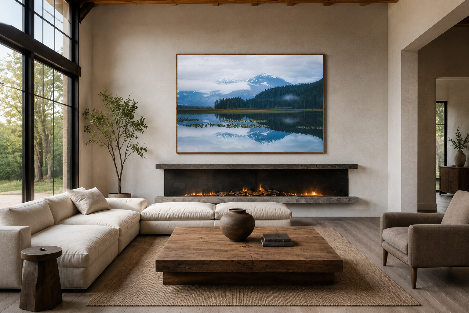 Large framed mountain reflection landscape photography above modern fireplace in luxury residential interior by Dan Sproul