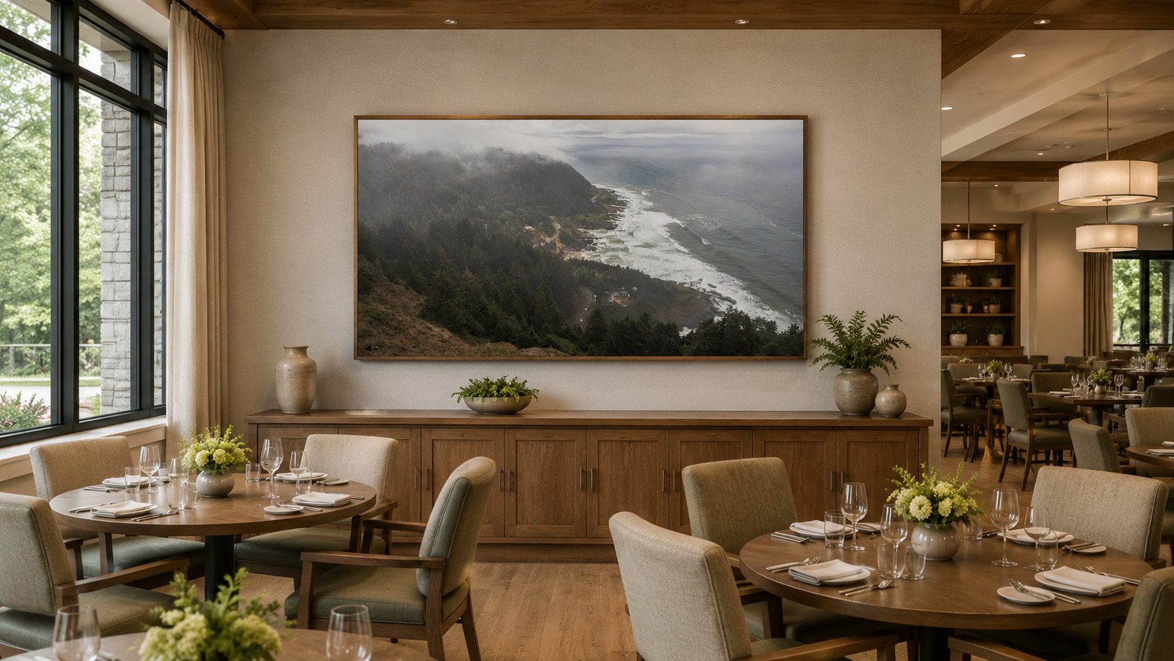 Senior living dining room with Oregon coast photography by Dan Sproul